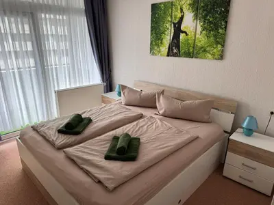 Ein Bett oder Betten in einem Zimmer der Unterkunft Waldtraum Schwimmbad Sauna Kinderbett wandern