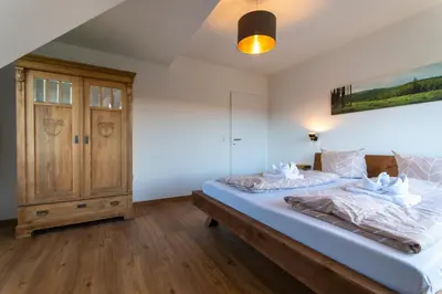 Ein Bett oder Betten in einem Zimmer der Unterkunft Ferienhaus Wolke 7