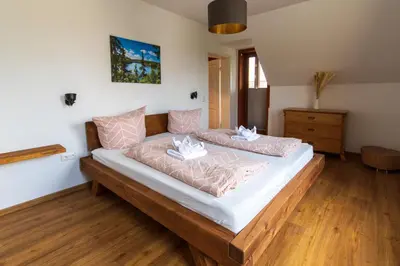 Ein Bett oder Betten in einem Zimmer der Unterkunft Ferienhaus Wolke 7