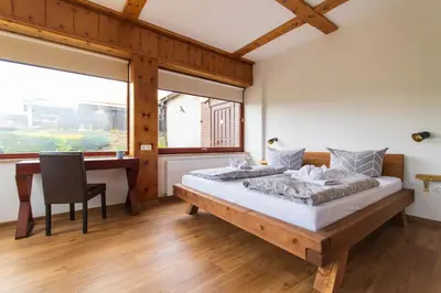 Ein Bett oder Betten in einem Zimmer der Unterkunft Ferienhaus Wolke 7