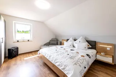 Ein Bett oder Betten in einem Zimmer der Unterkunft Ferienhaus Sammy