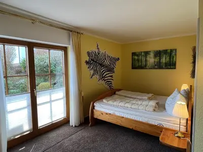 Ein Bett oder Betten in einem Zimmer der Unterkunft Ferienwohnung KaLü 2