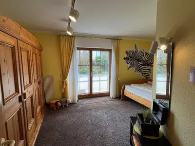 Ein Bett oder Betten in einem Zimmer der Unterkunft Ferienwohnung KaLü 2