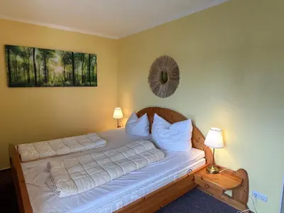Ein Bett oder Betten in einem Zimmer der Unterkunft Ferienwohnung KaLü 2