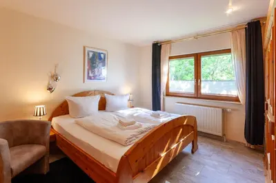 Ein Bett oder Betten in einem Zimmer der Unterkunft Ferienwohnung KaLü 3