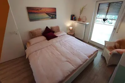 Ein Bett oder Betten in einem Zimmer der Unterkunft Ferienwohnung KaLü 3a