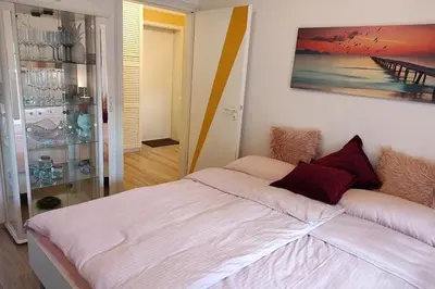 Ein Bett oder Betten in einem Zimmer der Unterkunft Ferienwohnung KaLü 3a