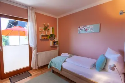 Ein Bett oder Betten in einem Zimmer der Unterkunft Ferienwohnung KaLü 4