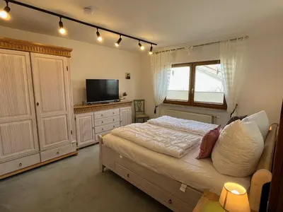 Ein Bett oder Betten in einem Zimmer der Unterkunft Ferienwohnung KaLü 4a