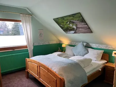 Ein Bett oder Betten in einem Zimmer der Unterkunft Ferienwohnung KaLü 6