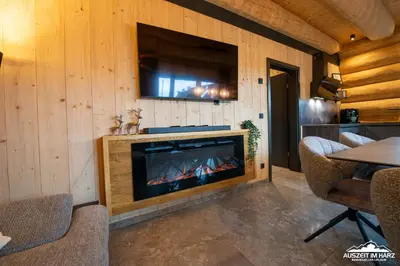 Ein Sitzbereich in der Unterkunft Auszeit im Harz - Haus 9 Blockhaus Alina