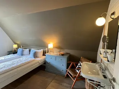 Ein Bett oder Betten in einem Zimmer der Unterkunft Ferienwohnung Oerdheks