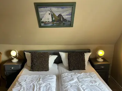 Ein Bett oder Betten in einem Zimmer der Unterkunft Ferienwohnung Oerdheks