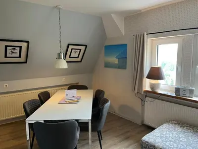Ein Sitzbereich in der Unterkunft Ferienwohnung Oerdheks
