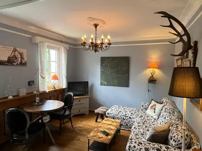 Ein Sitzbereich in der Unterkunft Ferienwohnung Waldhexe in der Villa Brockenhexe