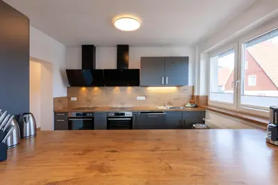 Küche/Küchenzeile in der Unterkunft Ferienhaus BergZeit mit Garten, Grill, Terrasse, maximal 20 Personen