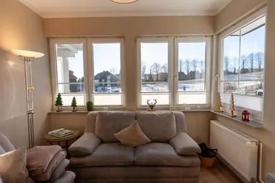 Ein Sitzbereich in der Unterkunft Ferienwohnung Morgenrot in der Villa Harzer Flair