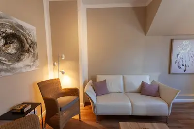 Ein Sitzbereich in der Unterkunft Ferienwohnung Abendsonne in der Villa Harzer Flair