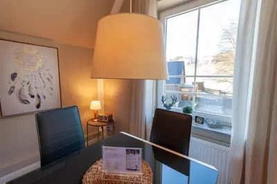 Ein Sitzbereich in der Unterkunft Ferienwohnung Abendsonne in der Villa Harzer Flair