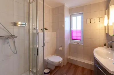 Ein Badezimmer in der Unterkunft Ferienwohnung Abendsonne in der Villa Harzer Flair