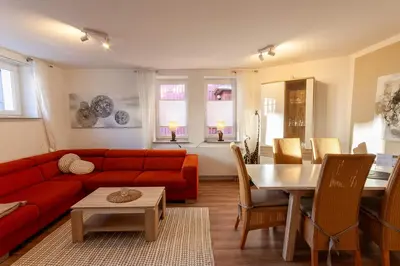 Ein Sitzbereich in der Unterkunft Ferienwohnung Mondschein in der Villa Harzer Flair