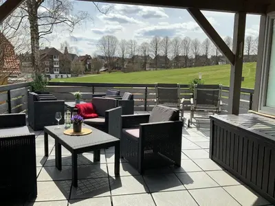 Ein Sitzbereich in der Unterkunft Ferienwohnung Sonnenschein in der Villa Harzer Flair
