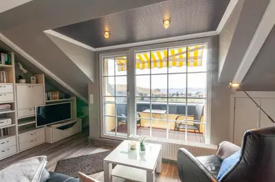 TV/Unterhaltungsangebot in der Unterkunft Ferienwohnung Kühl 3 mit Balkon, Sauna und Fitnessraum