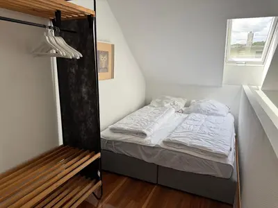 Ein Bett oder Betten in einem Zimmer der Unterkunft PrimeLoft Eule - bis 8 Pers - 2 Etagen - Balkon - modern & stilvoll - zentral in Braunlage
