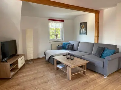 Ein Sitzbereich in der Unterkunft Landhaus Wiesengrund