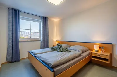 Ein Bett oder Betten in einem Zimmer der Unterkunft Elementa Lodges Green Suites