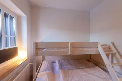 Ein Bett oder Betten in einem Zimmer der Unterkunft Ferienwohnung Hexenglück mit Balkon