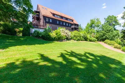 Ein Garten an der Unterkunft Maisonette-Ferienwohnung Hexennest