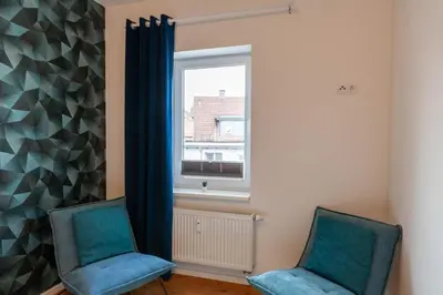 Ein Sitzbereich in der Unterkunft Ferienwohnung Herzog 1 mit Terrasse