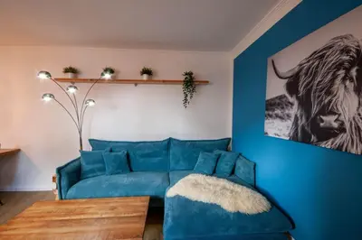Ein Sitzbereich in der Unterkunft Ferienwohnung Am Bach 1 mit Terrasse