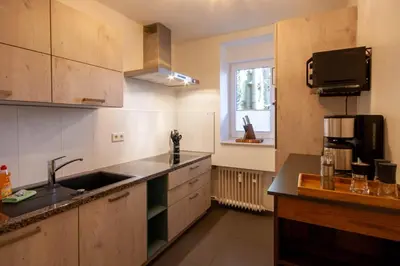 Küche/Küchenzeile in der Unterkunft Ferienwohnung Am Bach 1 mit Terrasse
