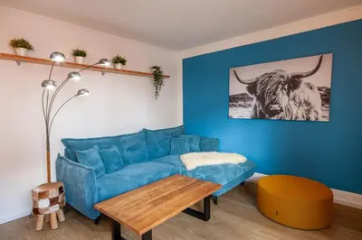 Ein Sitzbereich in der Unterkunft Ferienwohnung Am Bach 1 mit Terrasse