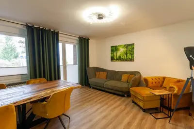 Ein Sitzbereich in der Unterkunft Ferienwohnung Am Bach 3 mit Balkon