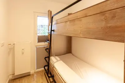 Ein Bett oder Betten in einem Zimmer der Unterkunft Ferienwohnung Harzer Jahreszeiten mit Terrasse