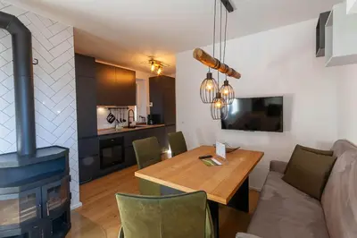 Küche/Küchenzeile in der Unterkunft Ferienwohnung Liftquartier mit Kamin und Balkon