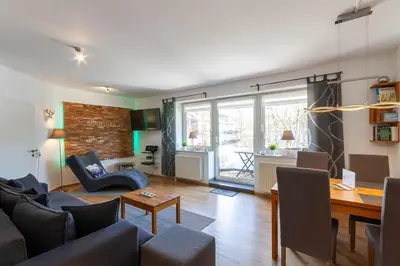 Ein Sitzbereich in der Unterkunft Ferienwohnung Wurmbergstation