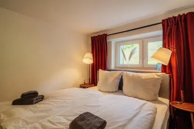 Ein Bett oder Betten in einem Zimmer der Unterkunft Harz Vital Lodge - super gemütliche Ferienwohnung