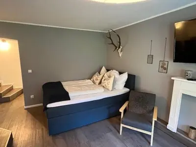 Ein Sitzbereich in der Unterkunft Harz Vital Lodge - super gemütliche Ferienwohnung