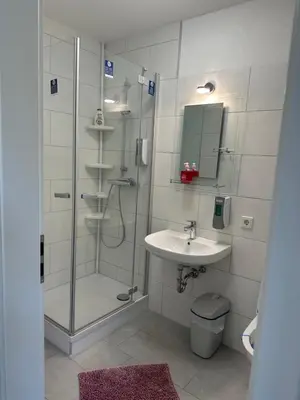 Ein Badezimmer in der Unterkunft Pension Syrtaki