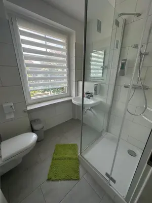 Ein Badezimmer in der Unterkunft Pension Syrtaki