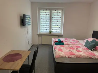 Ein Bett oder Betten in einem Zimmer der Unterkunft Pension Syrtaki
