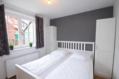Ein Bett oder Betten in einem Zimmer der Unterkunft Ferienwohnung Wurmbergzeit mit Terrasse