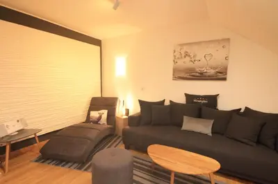Ein Sitzbereich in der Unterkunft Ferienwohnung Wurmbergherz