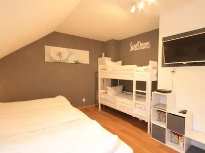 Ein Bett oder Betten in einem Zimmer der Unterkunft Ferienwohnung Wurmbergherz