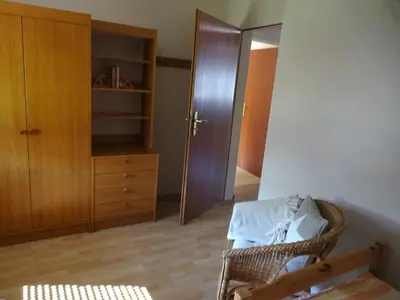 Ein Bett oder Betten in einem Zimmer der Unterkunft Ferienwohnung Schneemann
