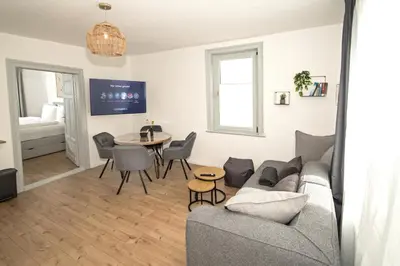 Ein Sitzbereich in der Unterkunft THEFIVE60 Apartments